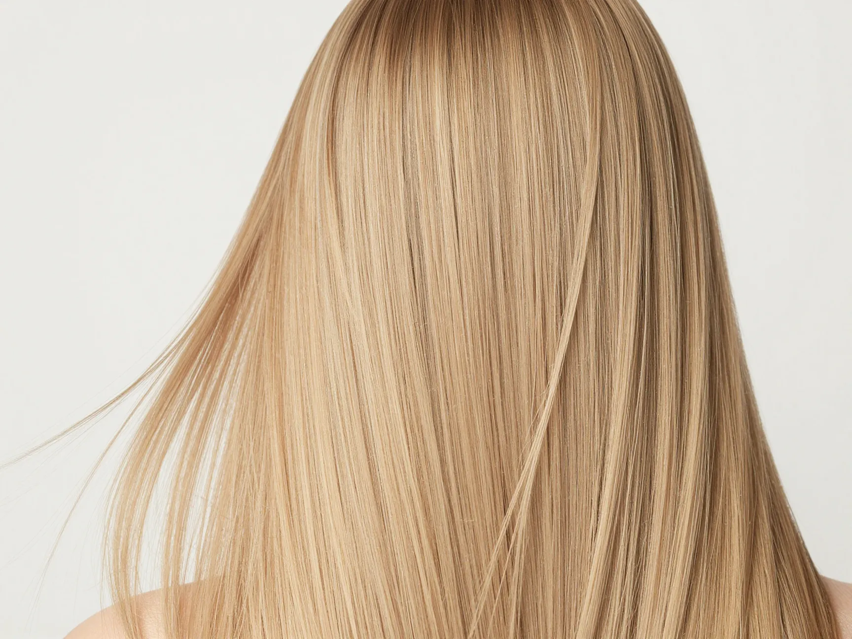 Buttery blonde balayage creamy neutral tones on straight fine hair