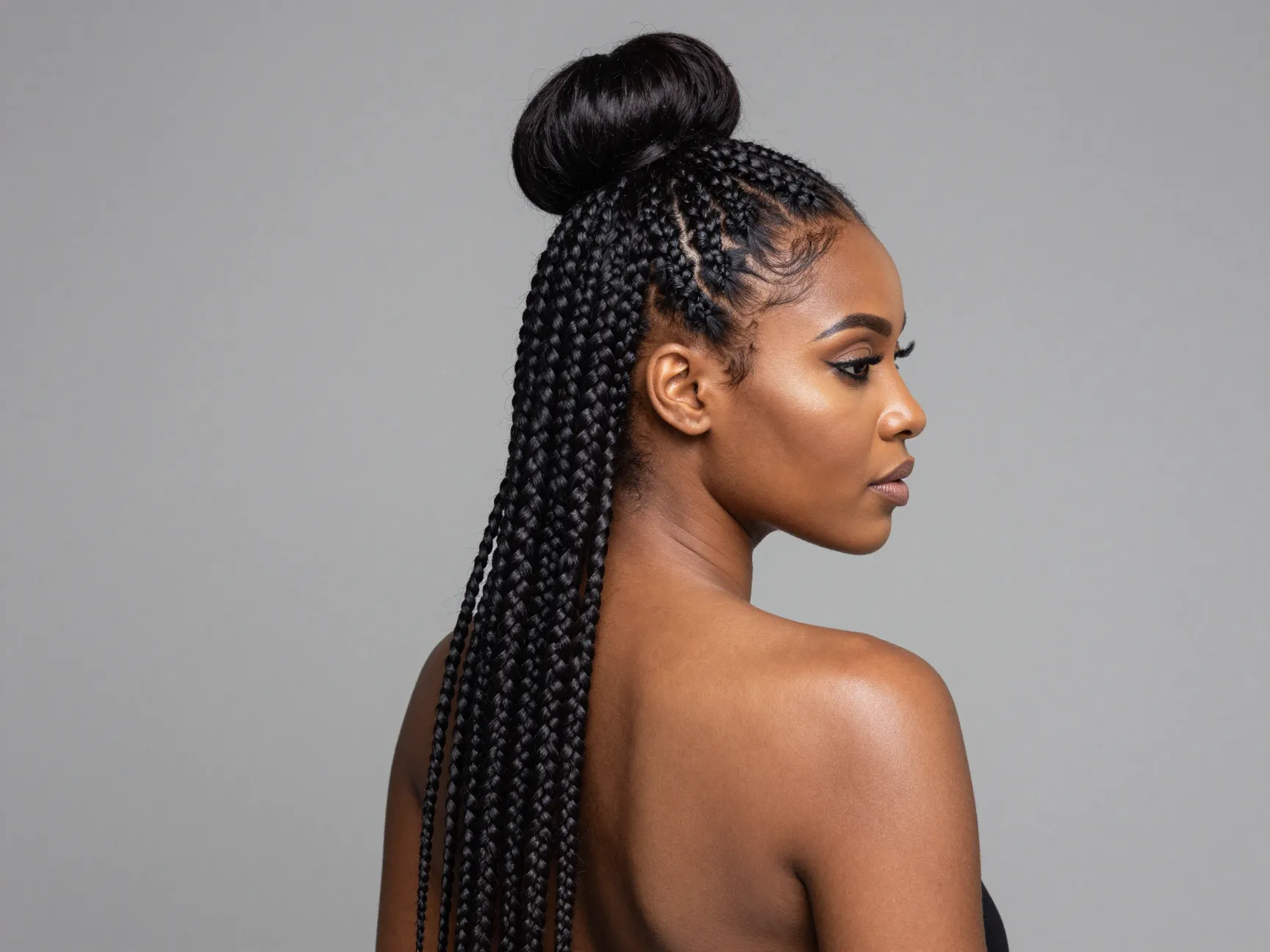 Ghana braids feed in technique with sleek high bun