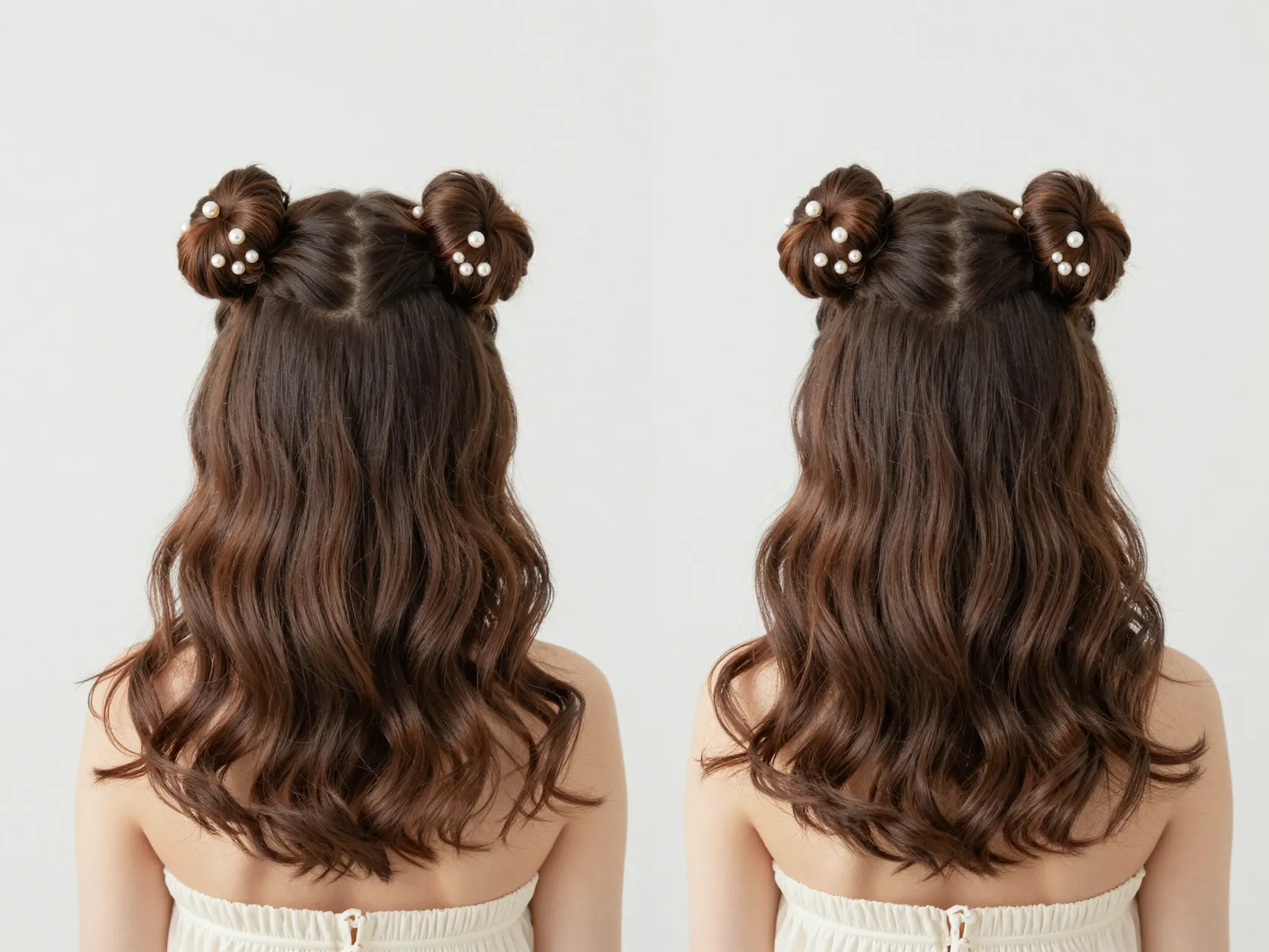 Two small symmetrical twisted buns with pearl pins