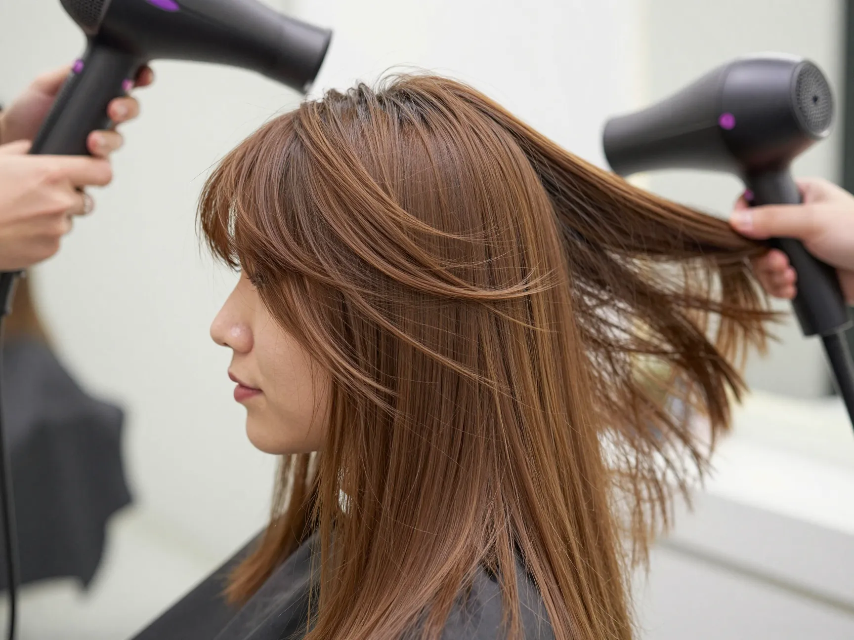 Butterfly haircut on straight hair with round brush blowout