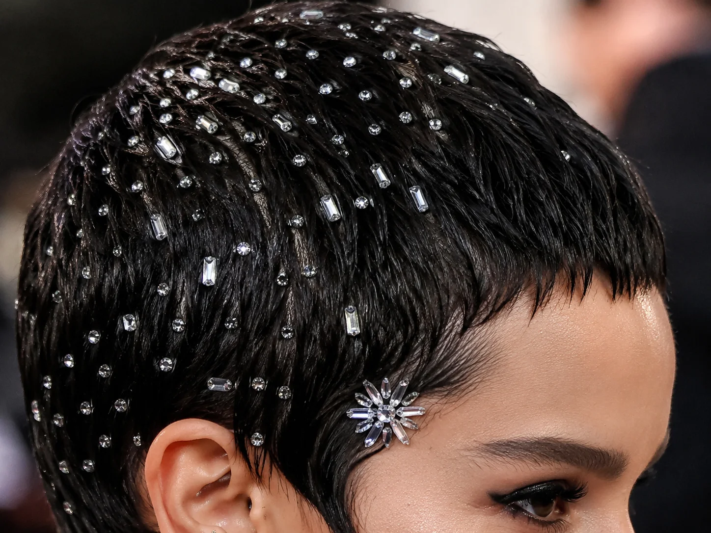 Very short pixie cut with scattered crystal and rhinestone hair pins