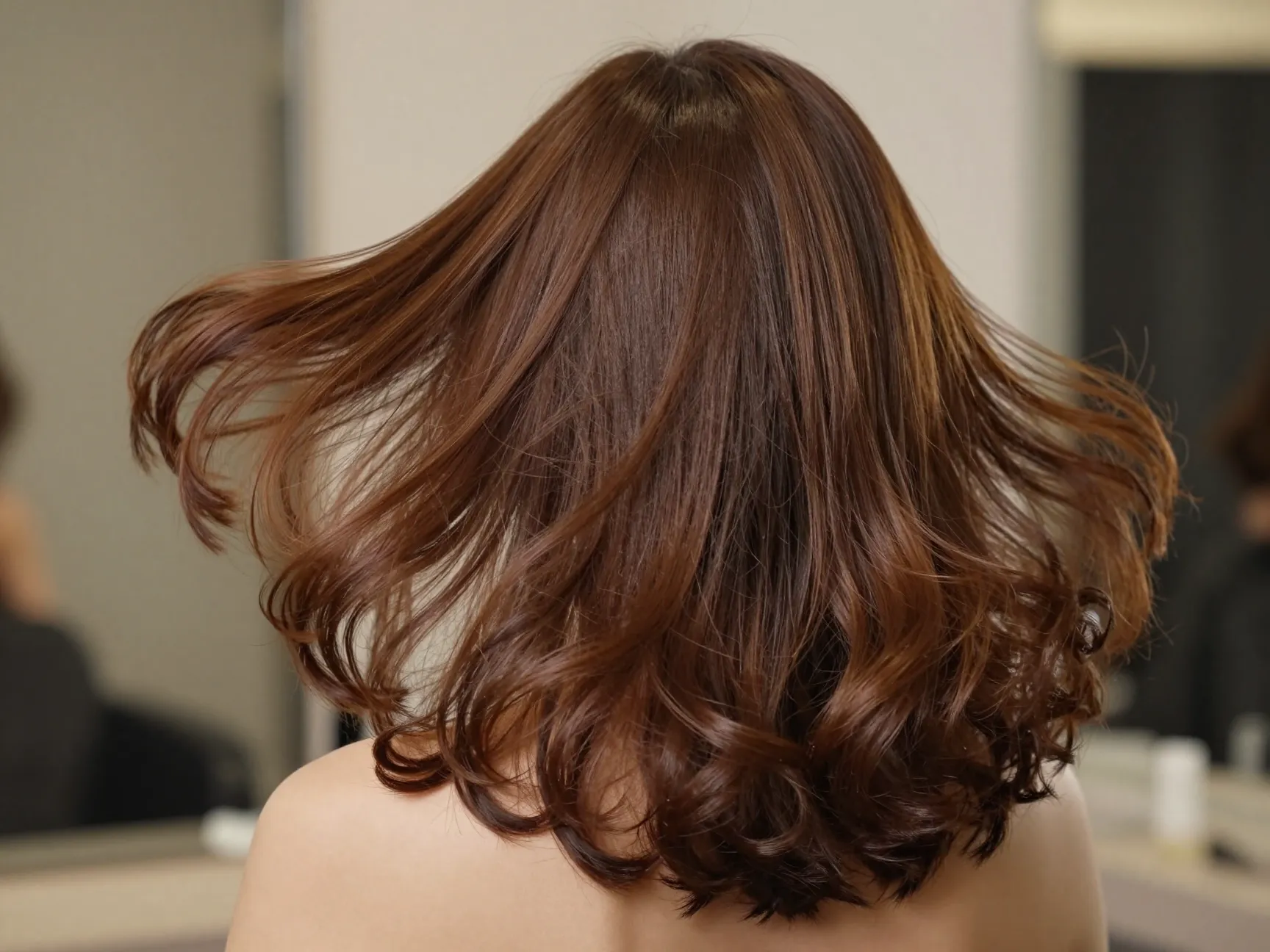 Mocha latte brown hair blowout bouncy curls dimension