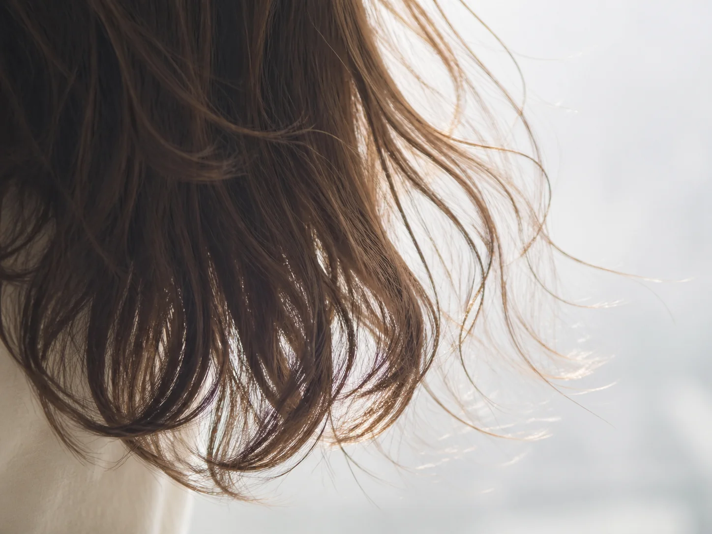 Layered butterfly cut with delicate wispy featherlight ends