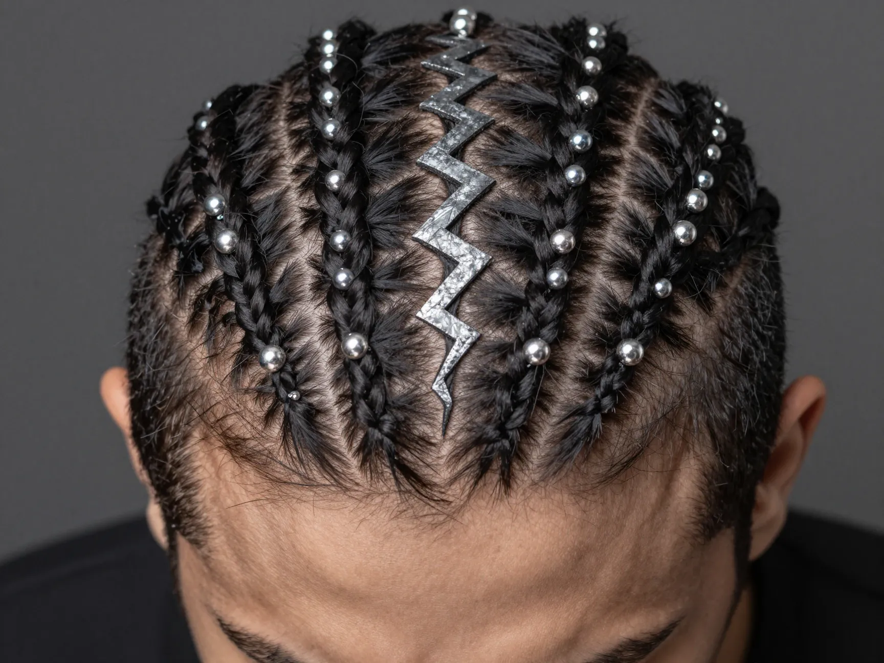Overhead view zig zag part cornrows with silver metallic beads