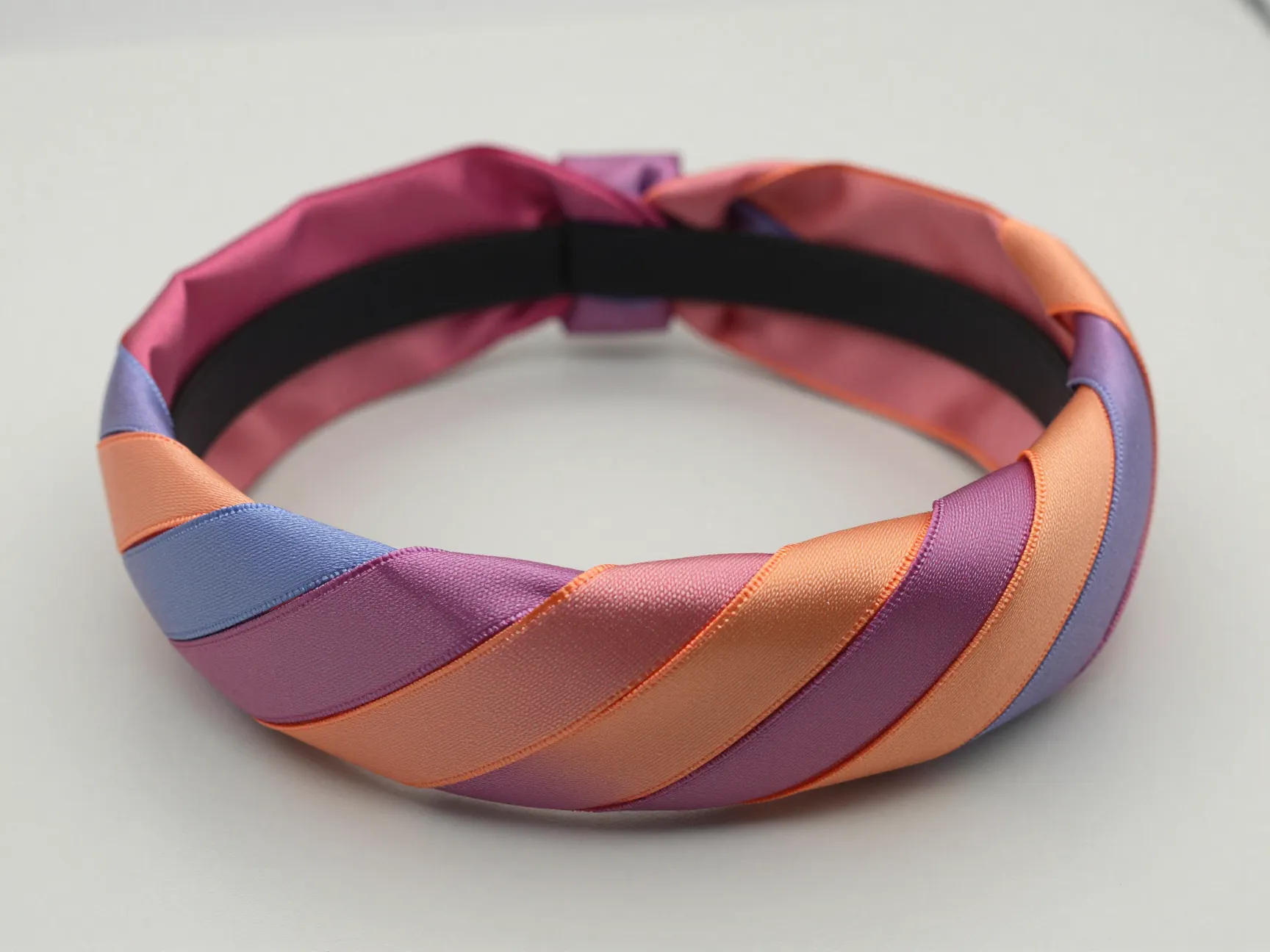Ribbon wrapped headband satin diagonal wrap polished finish