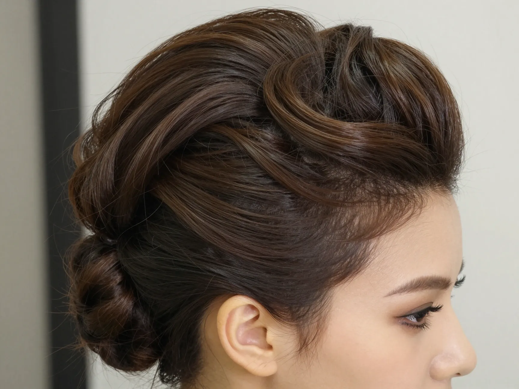 Voluminous pompadour updo bold fashion forward teased crown