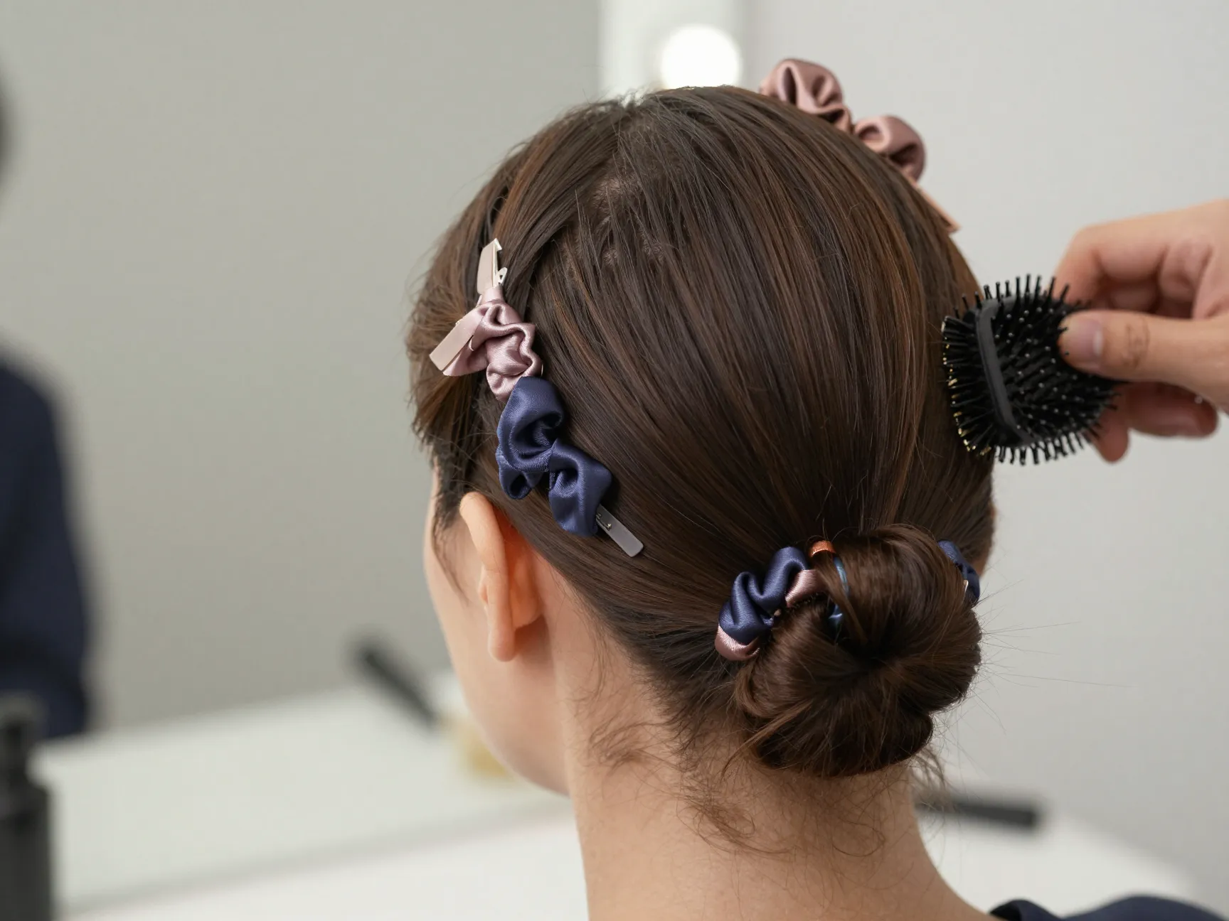 Horizontal sectioning sleek bun three layers slicked back satin scrunchie clips