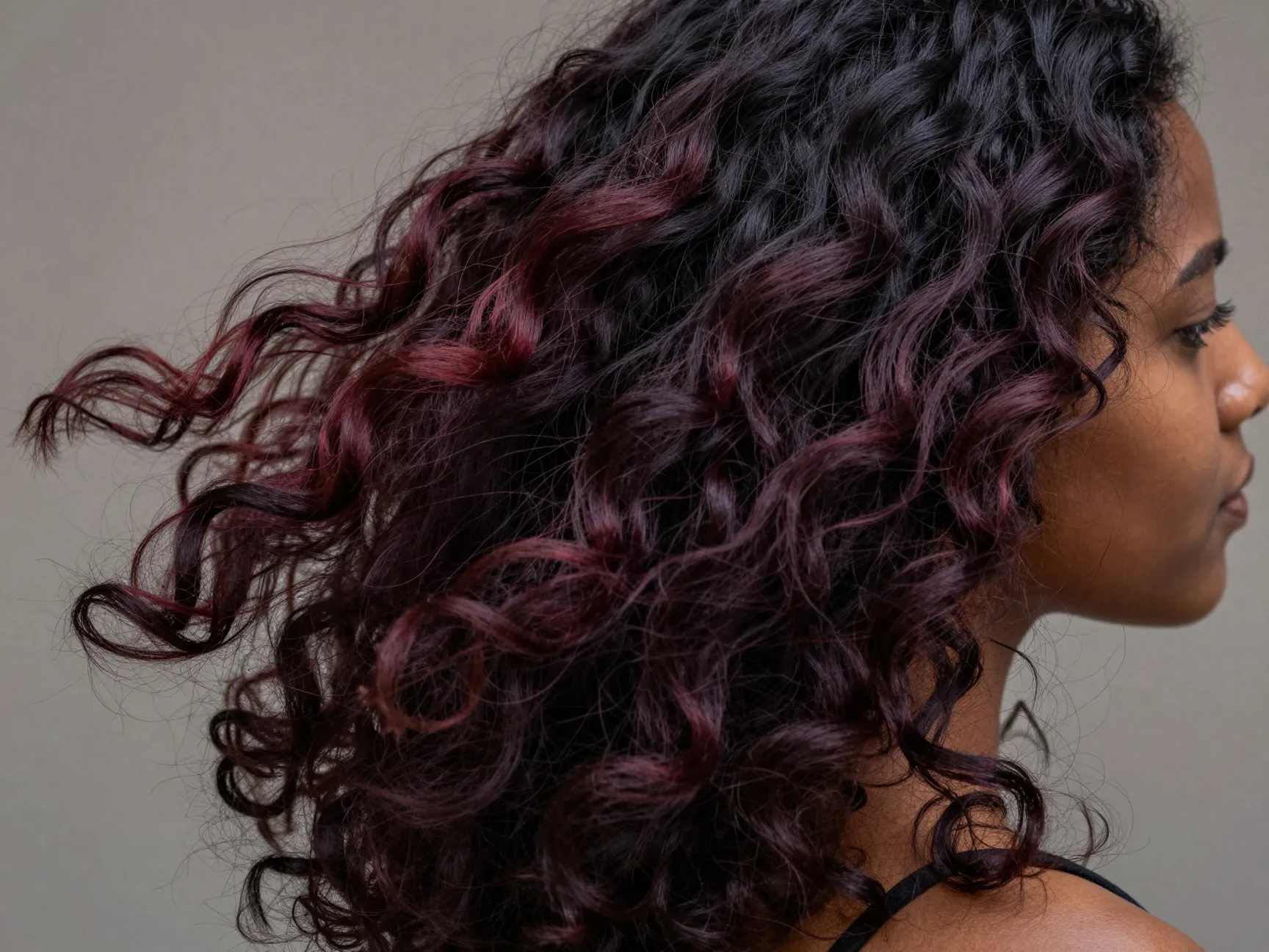 Burgundy highlights on black hair for darker skin tone