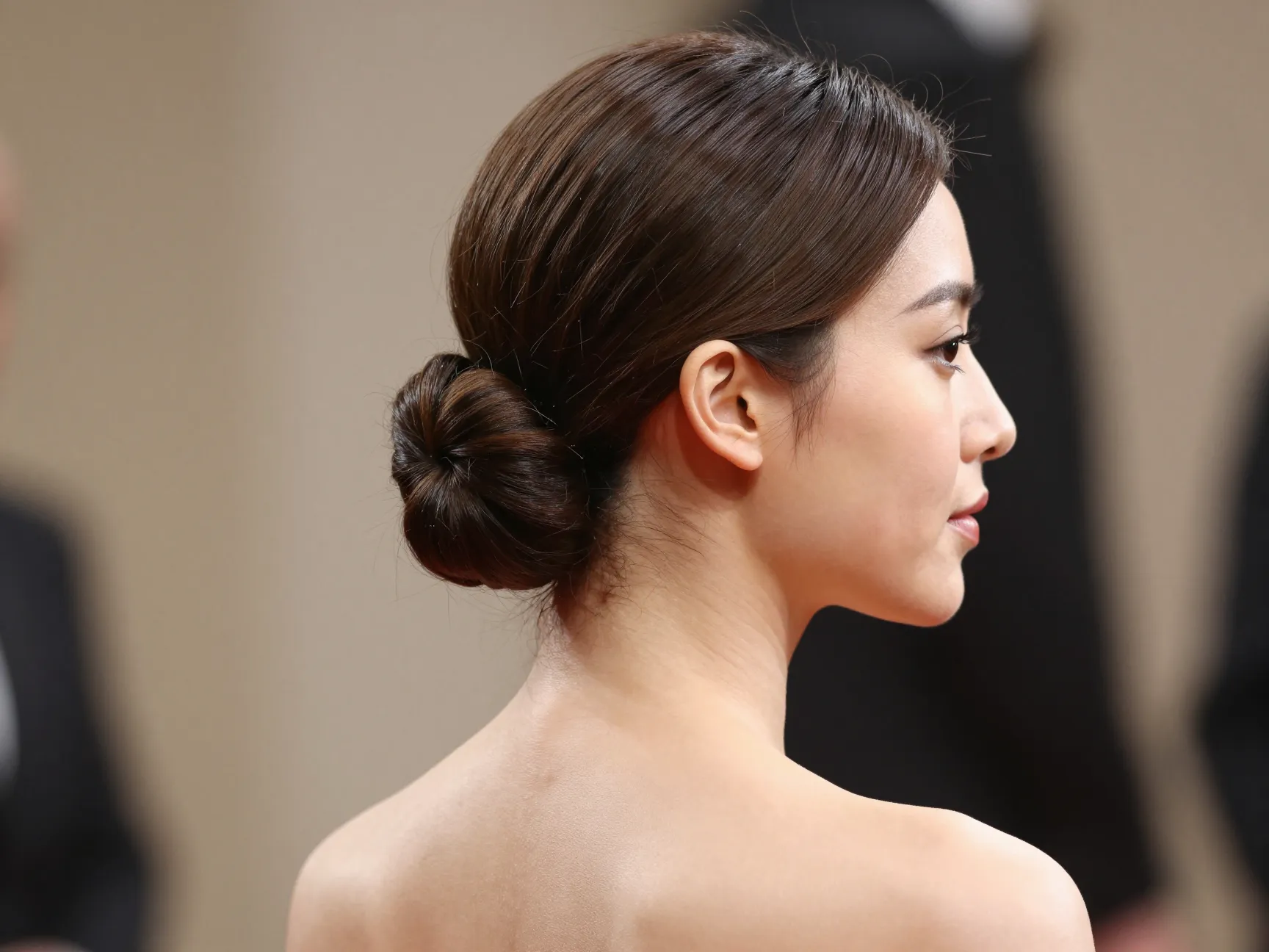 Short chignon elegant low knot smooth pinned french tuck