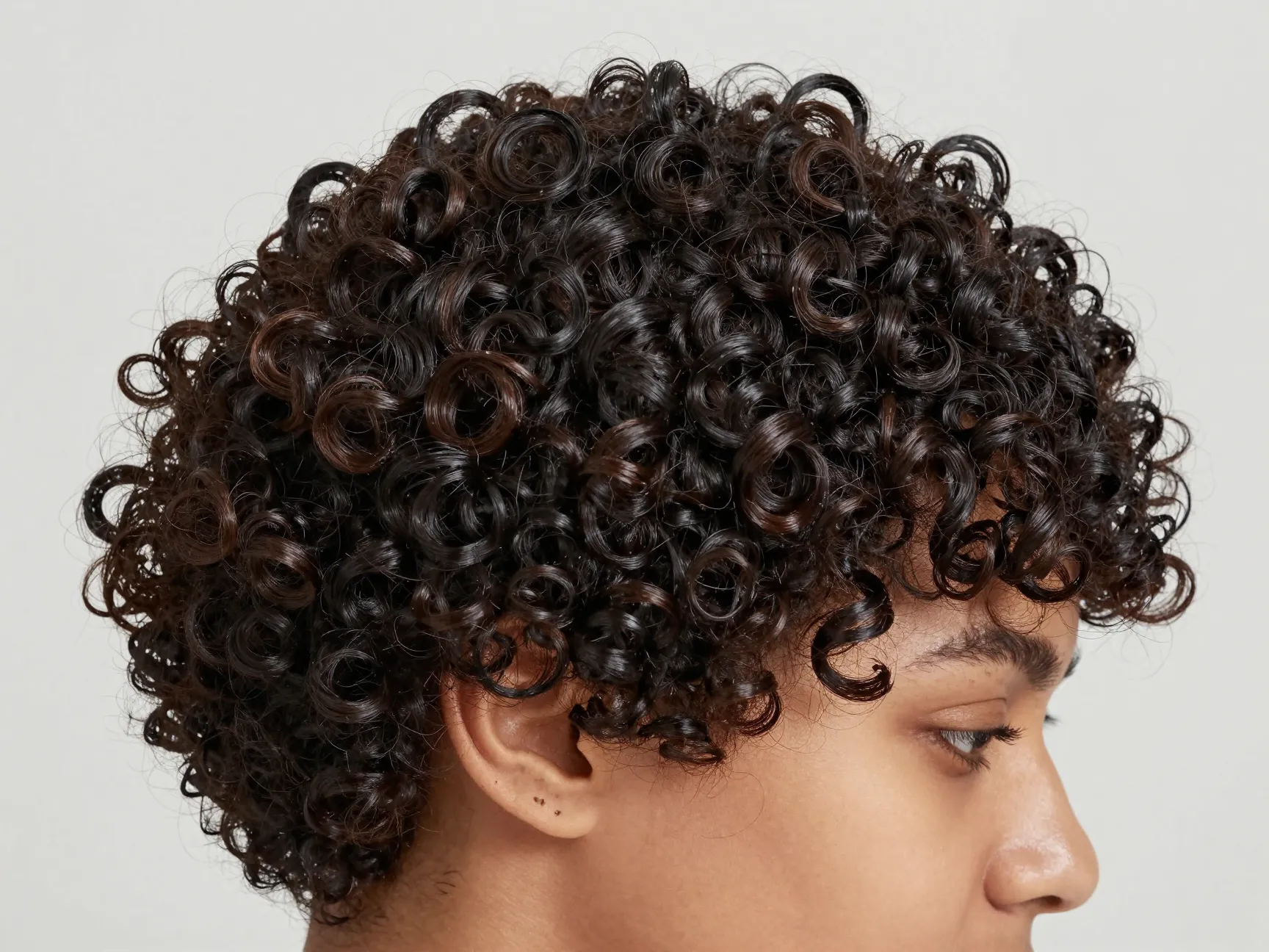 Defined wash and go cut tight coils zero styling portrait