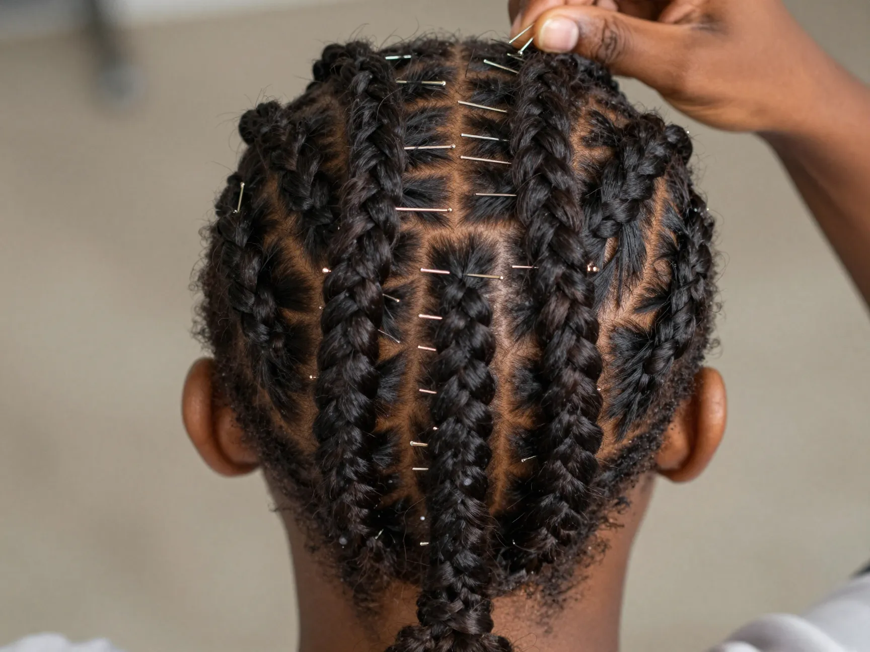 Creating braided base for weave ponytail with bobby pins