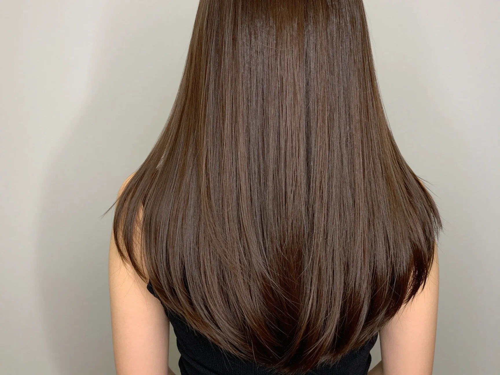 V shape layers creating dimensional movement on long straight hair