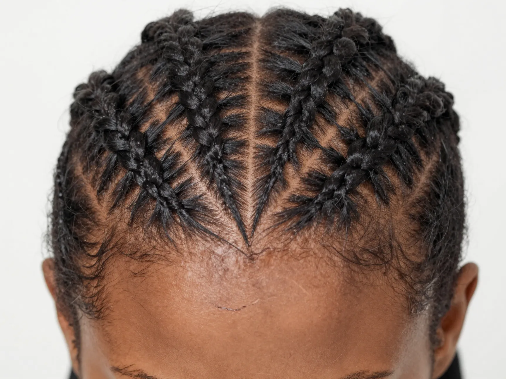 Triangle part knotless braids geometric pattern on scalp