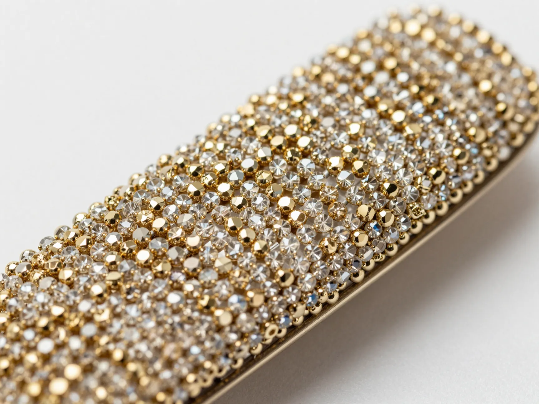 Densely beaded gradient rectangular barette shimmering under studio light