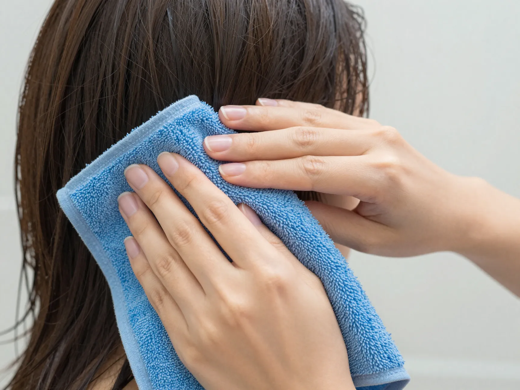 Microfiber towel blotting wet hair gentle drying method