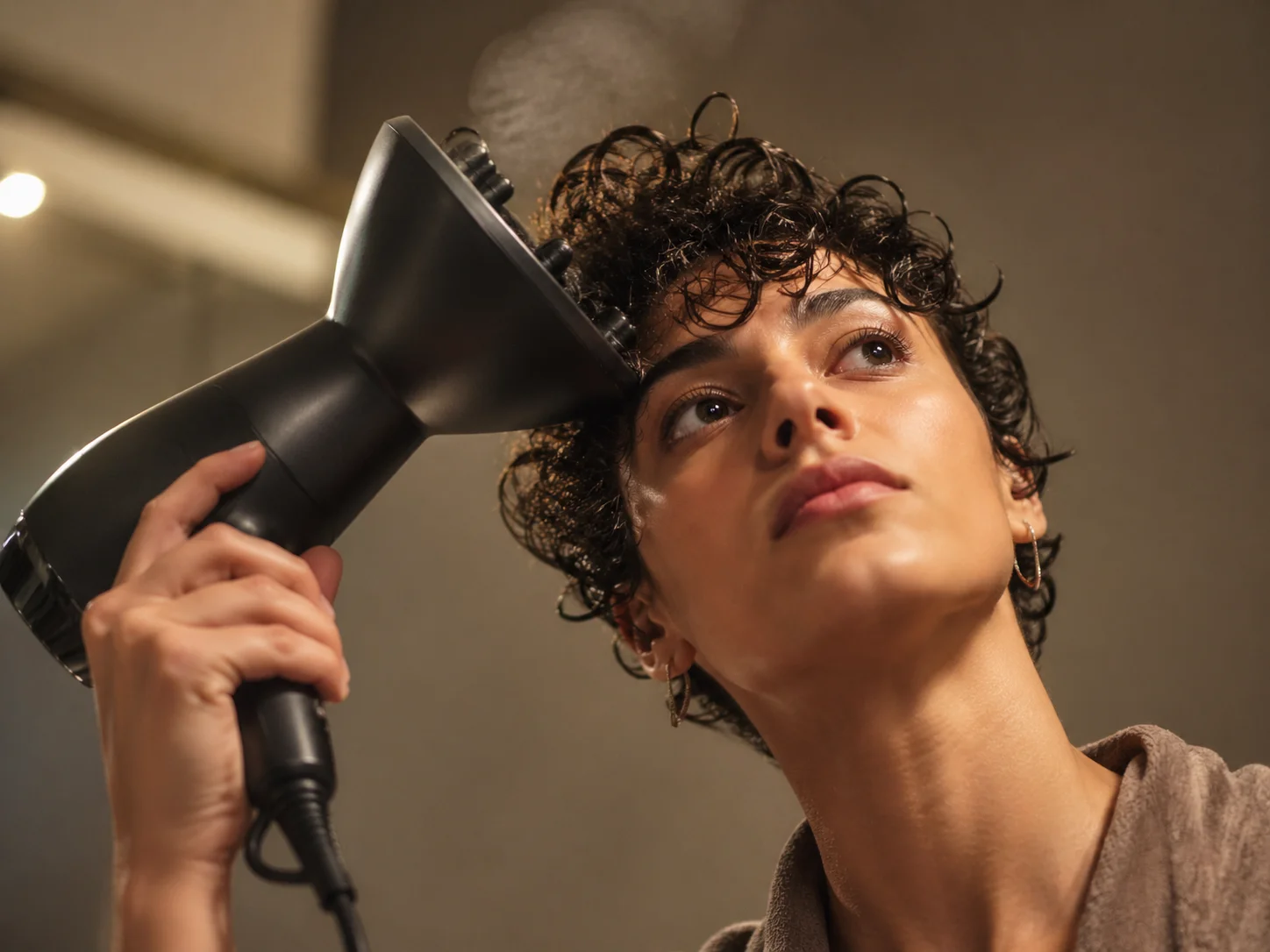 Diffusing short curly hair with a bowl shaped diffuser on medium heat