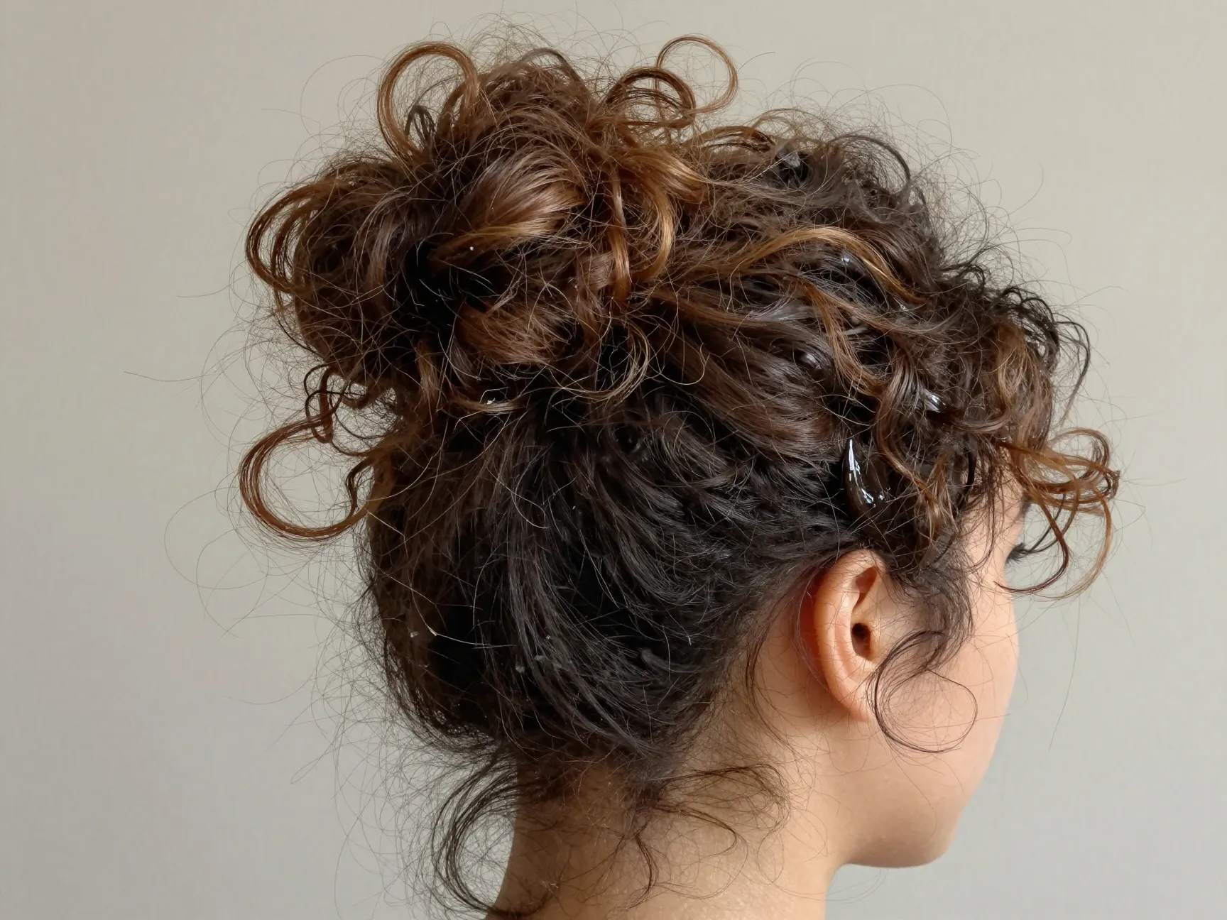 Messy bun controlled chaos volume intentional undone