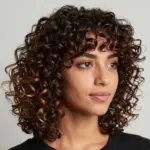 9 Perfect Butterfly Haircuts for Medium Curly Hair (Enhance Your Texture)