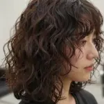 8 Perfect Hairstyles for Wavy Curly Hair (The In-Between Texture)