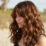 8 Effortless Butterfly Haircuts with Curtain Bangs for a Face-Framing Look