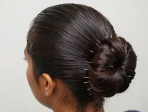 Read more about the article 9 Elegant Sleek Back Bun Techniques for Natural Hair
