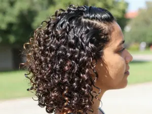 Read more about the article 9 Cute Slick Back Hairstyles for Curly Hair That Defy Frizz